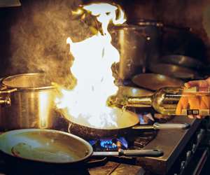 chef cooking with a saute pan