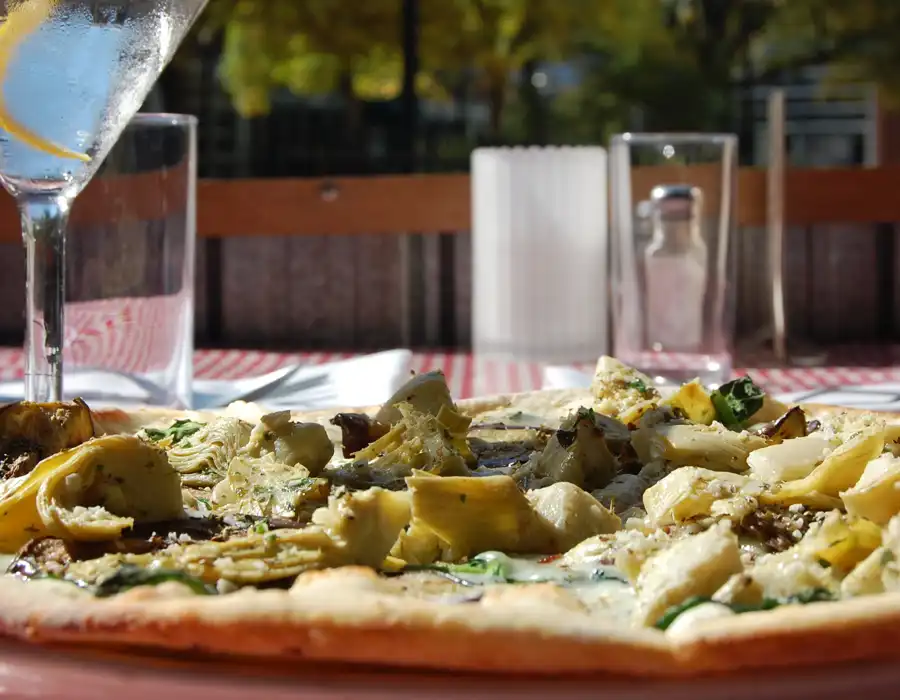 artichoke pizza on a table