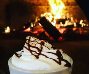 hot chocolate in front of a wood burning oven